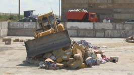 Электронные сигареты, общей стоимостью миллиард тенге, раздавили бульдозером в Павлодаре